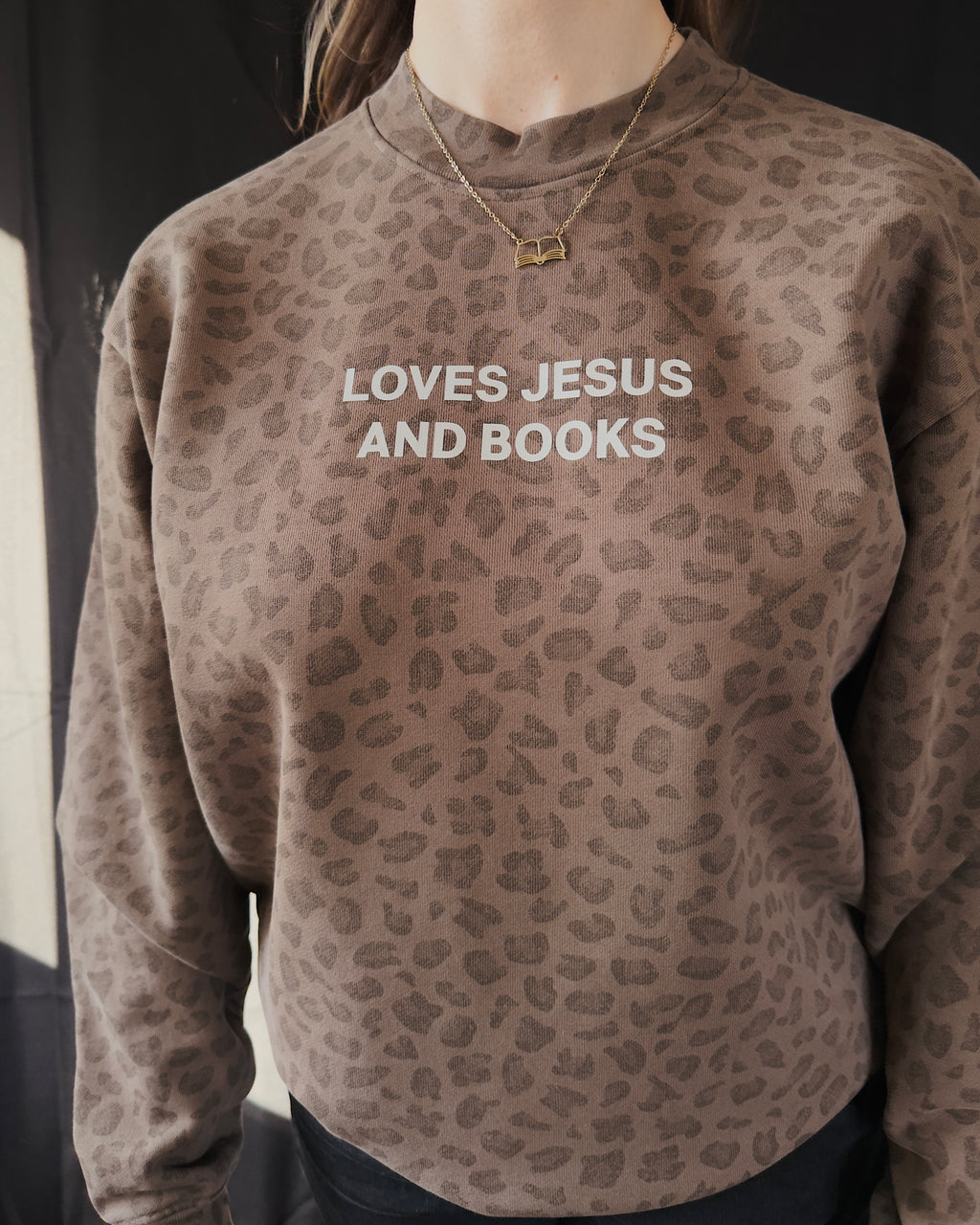 Loves Jesus And Books Crewneck