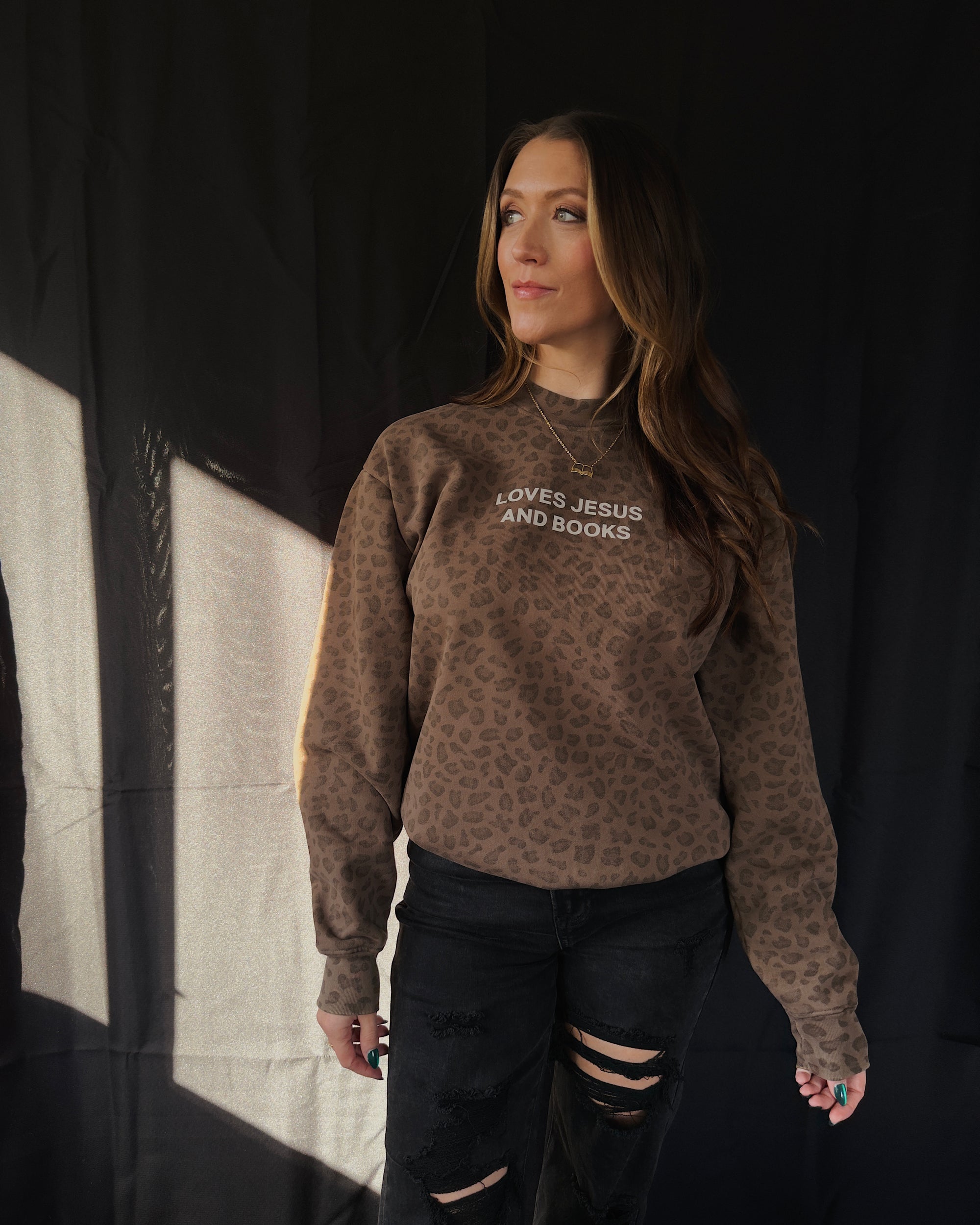 Loves Jesus And Books Crewneck