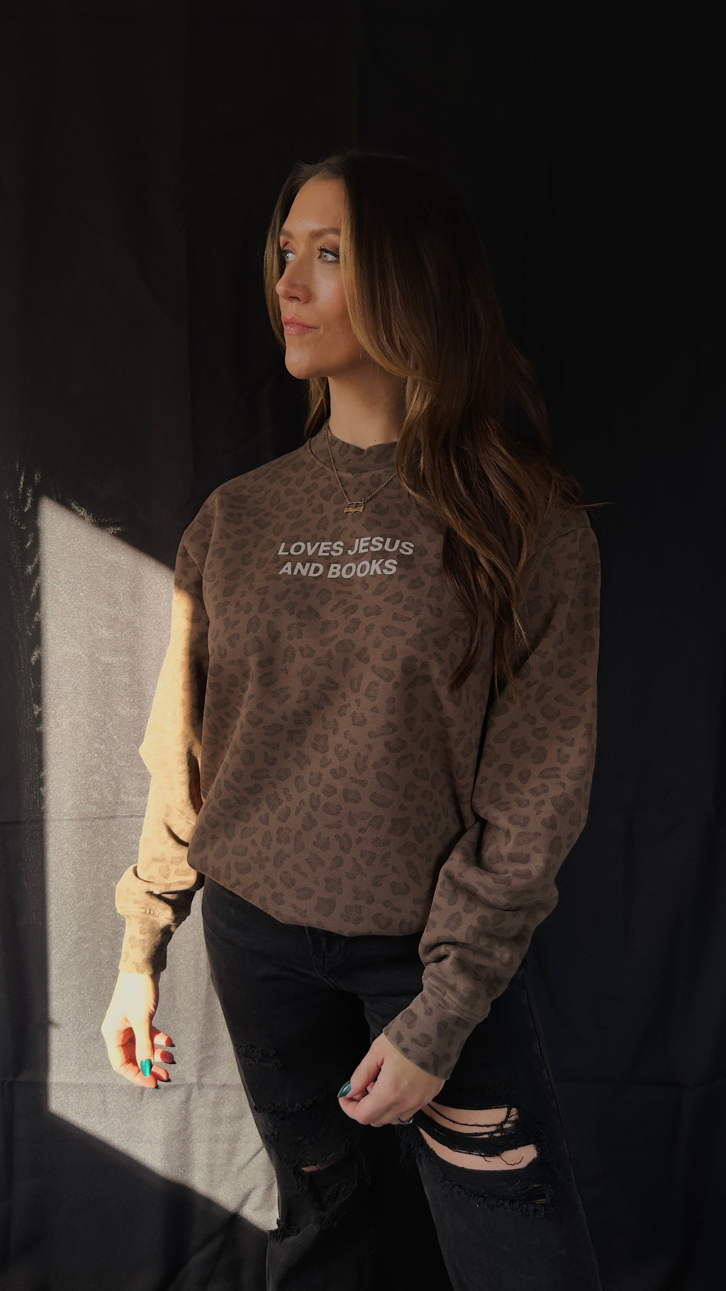 Loves Jesus And Books Crewneck